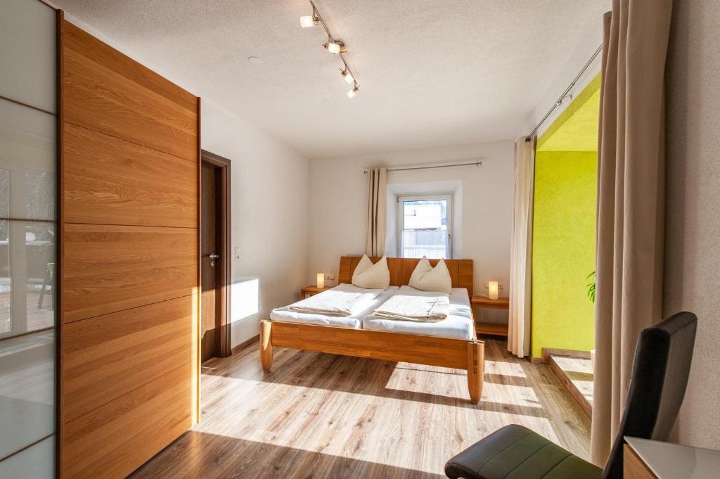 Posteľ alebo postele v izbe v ubytovaní Appartement 103