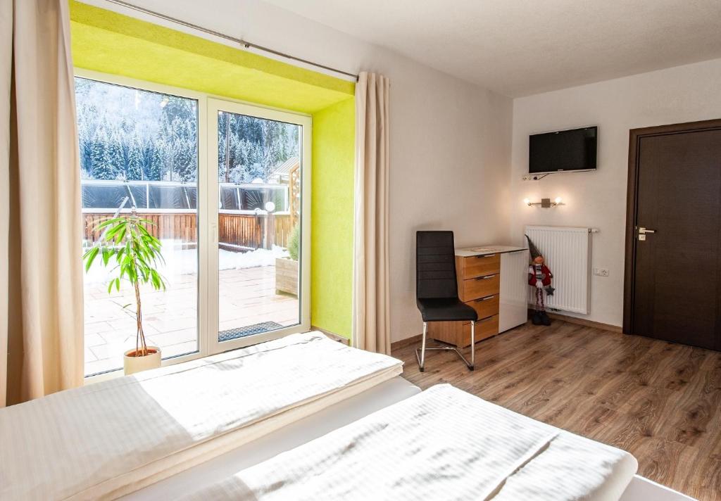 Posteľ alebo postele v izbe v ubytovaní Appartement 103