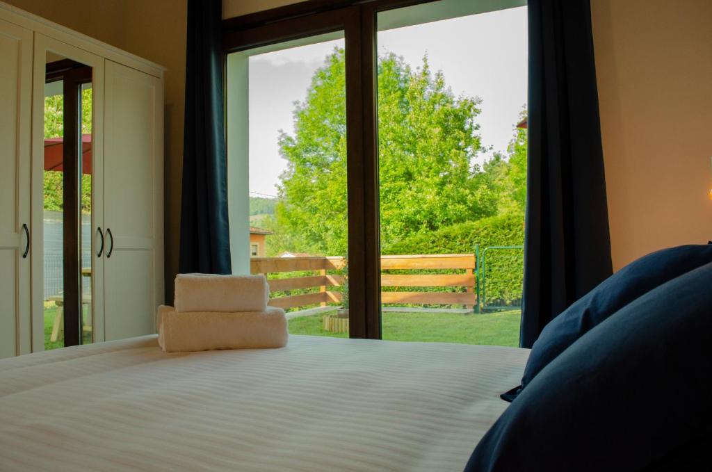 Postel nebo postele na pokoji v ubytování Apartamentos El Respigu