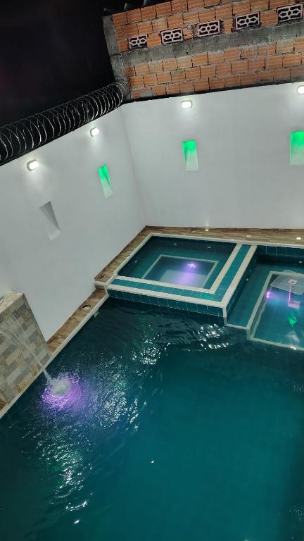 Bazén v ubytování Ricaurte Cundinamarca Casa con piscina nebo v jeho okolí