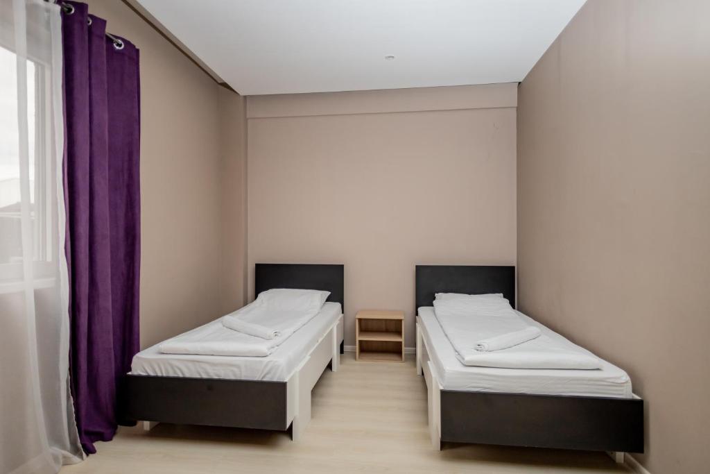 Postel nebo postele na pokoji v ubytování VILIN