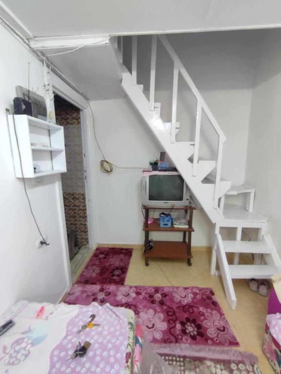 Postel nebo postele na pokoji v ubytování sand studio