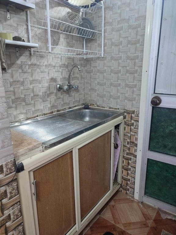 Kuchyň nebo kuchyňský kout v ubytování sand studio