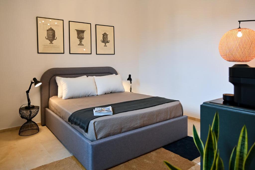 Postel nebo postele na pokoji v ubytování Palazzo Sottil