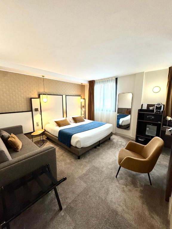 Postel nebo postele na pokoji v ubytování Best Western Hotel Le Quercy