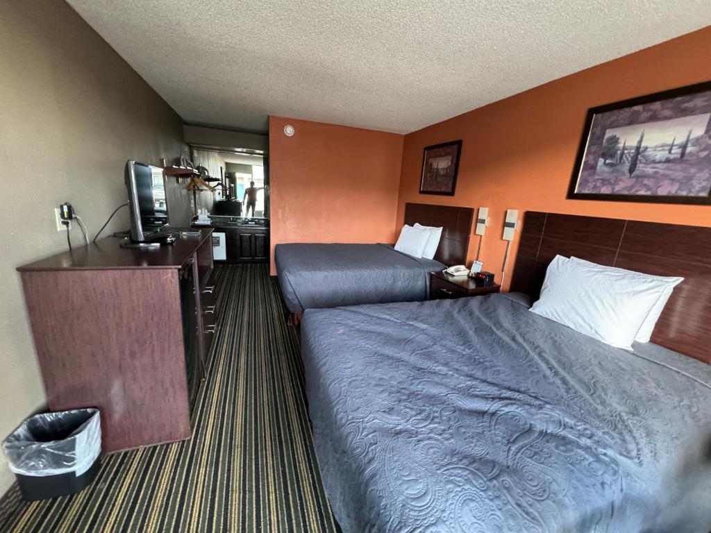 Ein Sitzbereich in der Unterkunft labh inc Motel