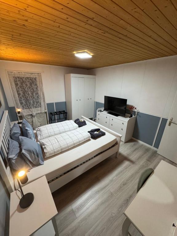 Postel nebo postele na pokoji v ubytování Blue Sky Apartments