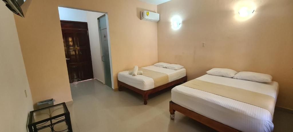 Postelja oz. postelje v sobi nastanitve Hotel Rosa de los vientos