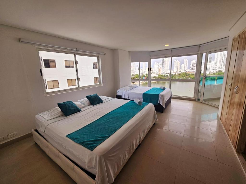 Postel nebo postele na pokoji v ubytování Torres del lago Pegasus Group Cartagena