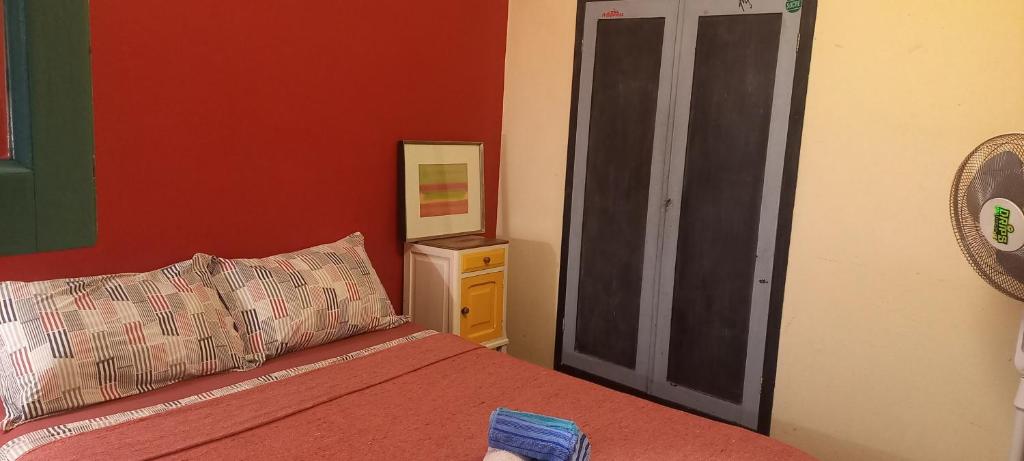 Postel nebo postele na pokoji v ubytování Casa del arbol hostel