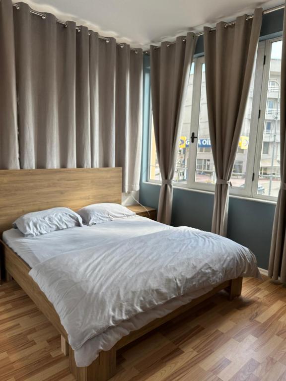 Postel nebo postele na pokoji v ubytování Vila Topciu