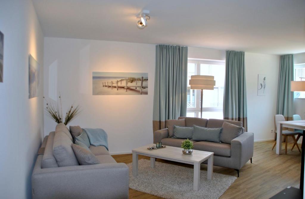 Posezení v ubytování Ferienwohnung "Silbermöwe II", Hafenspitze Quartier