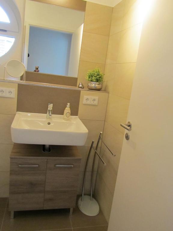 Koupelna v ubytování Ferienwohnung "Silbermöwe II", Hafenspitze Quartier