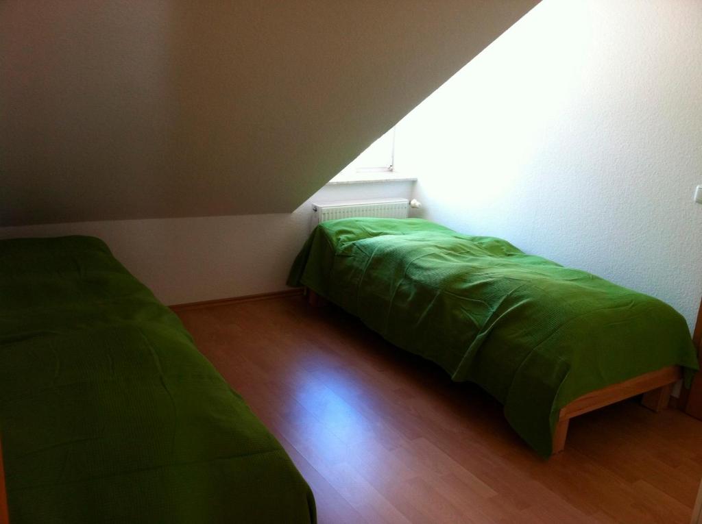 Postel nebo postele na pokoji v ubytování Ferienwohnung "Humburg", Strand und Stadt