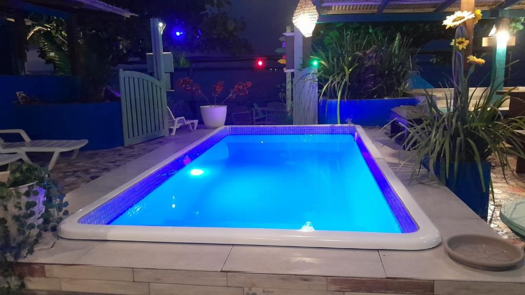 Bazén v ubytování Beija Flor nebo v jeho okolí