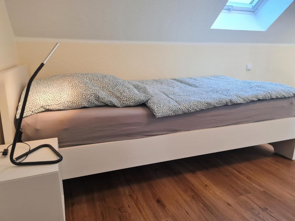 Postel nebo postele na pokoji v ubytování Ferienwohnung Dons - Strandnahe & moderne Fewo im Ostseebad Grömitz