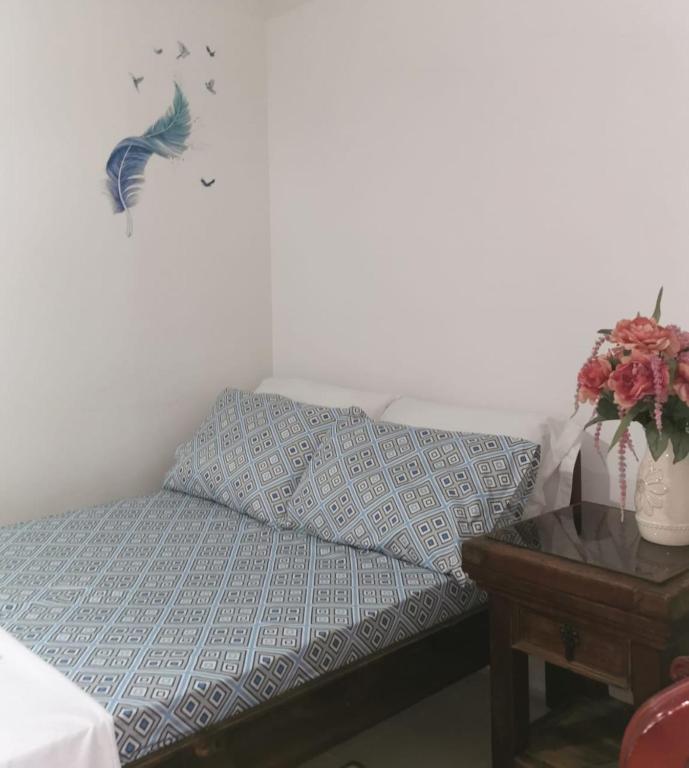 Postel nebo postele na pokoji v ubytování Casa San Joaquin