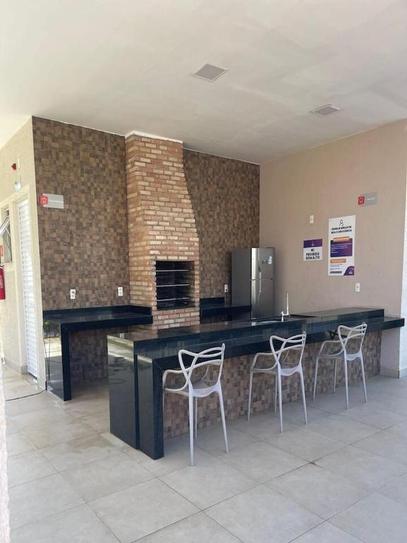 Kuchyň nebo kuchyňský kout v ubytování Apartamento Espaço Aruba