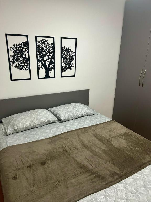 Postel nebo postele na pokoji v ubytování Apartamento Espaço Aruba