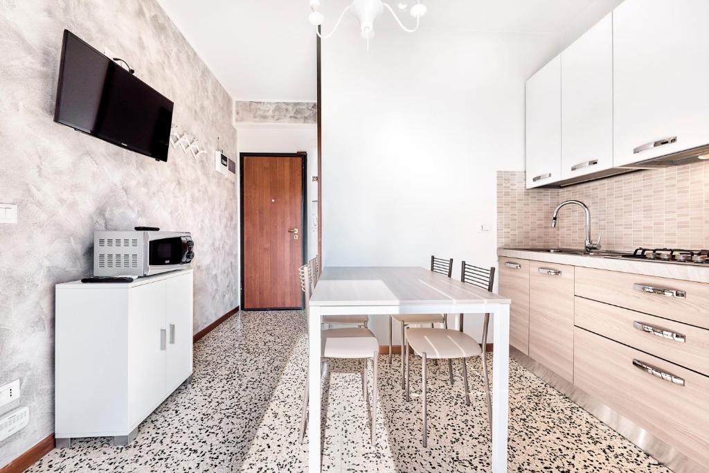 Kuchyň nebo kuchyňský kout v ubytování Jesolo Happy Beach House - Host Solution
