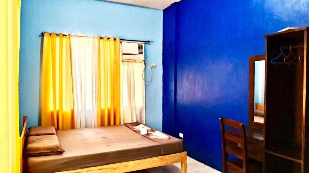 Postel nebo postele na pokoji v ubytování James Homestay
