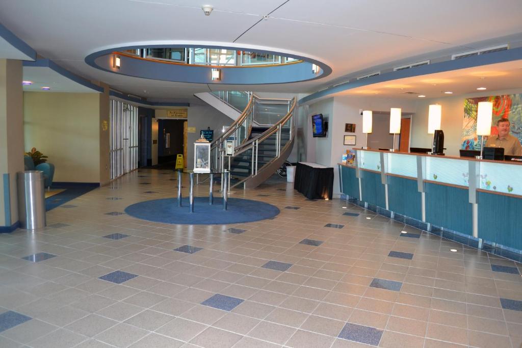 a hallway with a staircase in a building at Avista Resort in Myrtle Beach