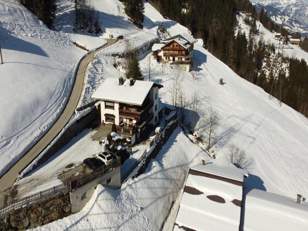 an aerial view of a house in the snow at Holiday apartment near ski area in Aschau