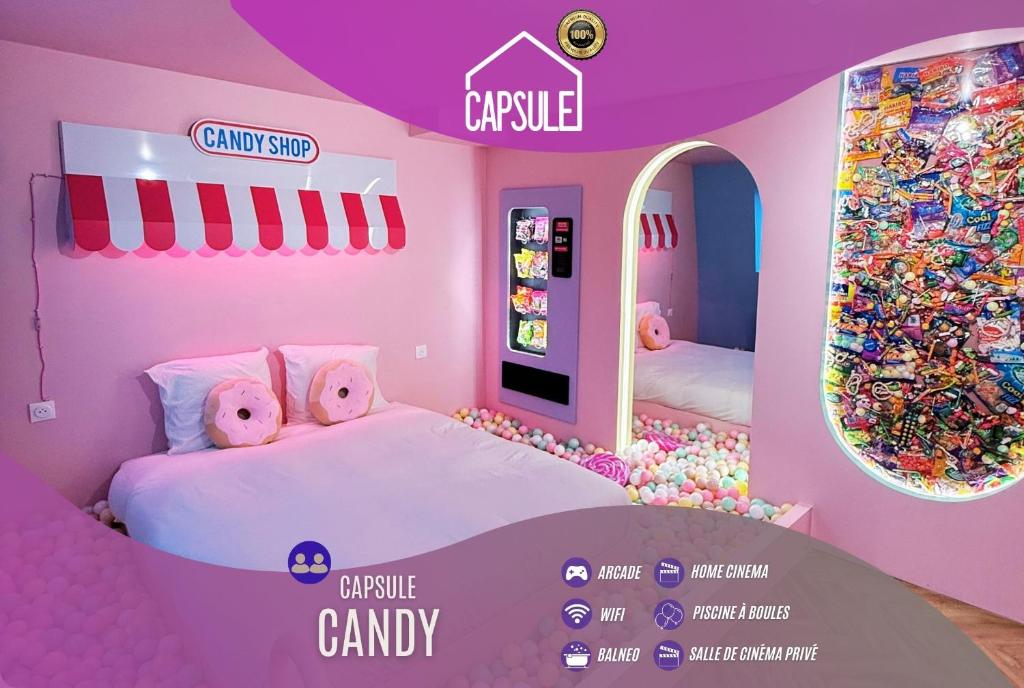 a room with two beds in a pink room with sprinkles at Capsule Candy - piscine à boules - cinéma privé in Roubaix