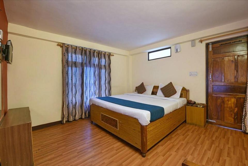 Postel nebo postele na pokoji v ubytování NAiNi VIEW RESORT