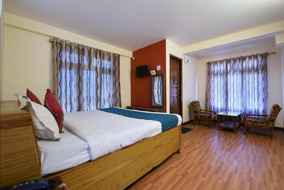 Postel nebo postele na pokoji v ubytování NAiNi VIEW RESORT