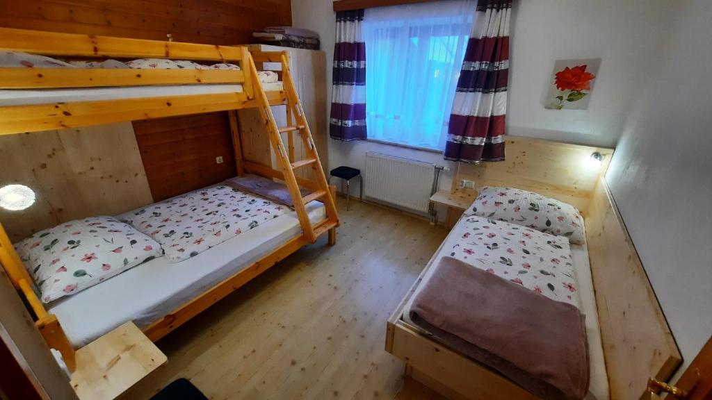 Postel nebo postele na pokoji v ubytování Urlaub am Bauernhof Gänser