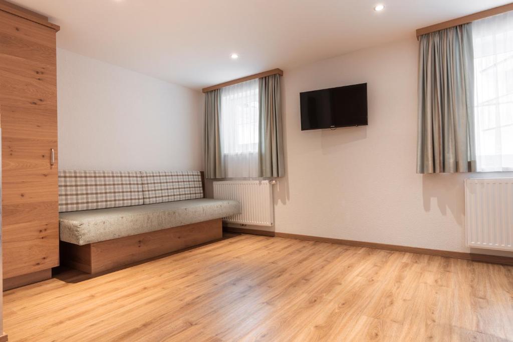 Posteľ alebo postele v izbe v ubytovaní SCHMID Rooms & Apartments