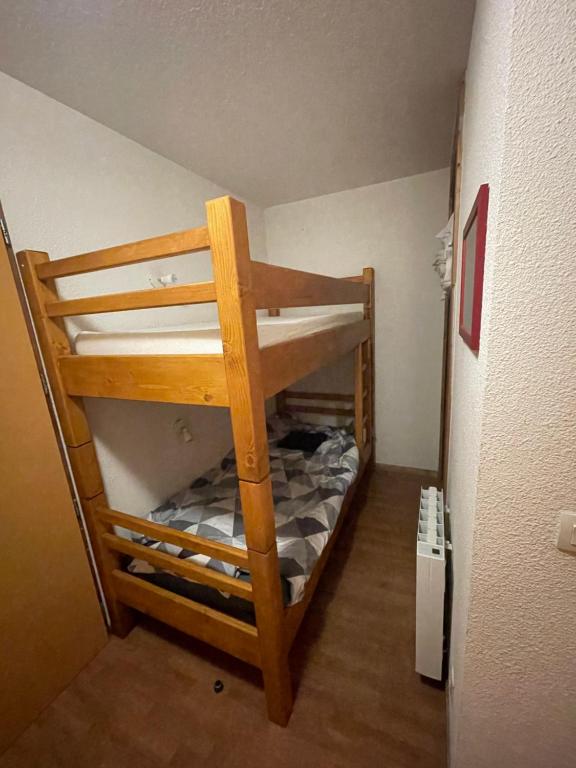 Postel nebo postele na pokoji v ubytování Orelle les 3 Vallées