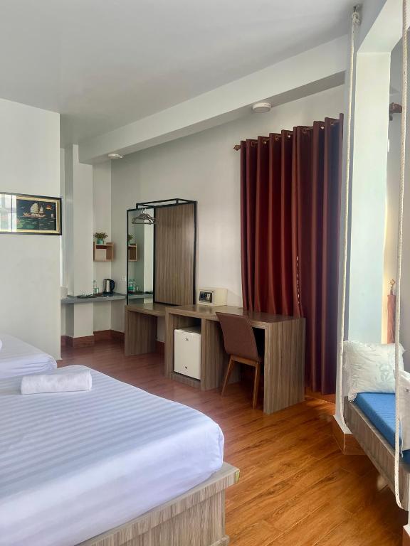 Postel nebo postele na pokoji v ubytování 2N Residence