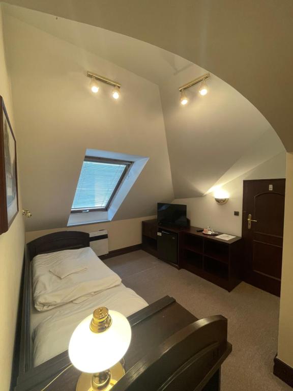 Postel nebo postele na pokoji v ubytování Hotel Bravo
