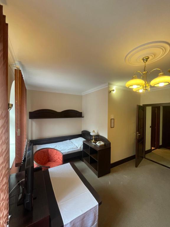Postel nebo postele na pokoji v ubytování Hotel Bravo