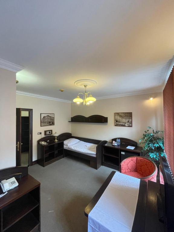 Postel nebo postele na pokoji v ubytování Hotel Bravo