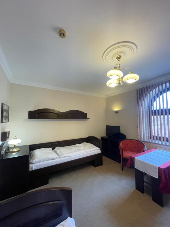 Postel nebo postele na pokoji v ubytování Hotel Bravo