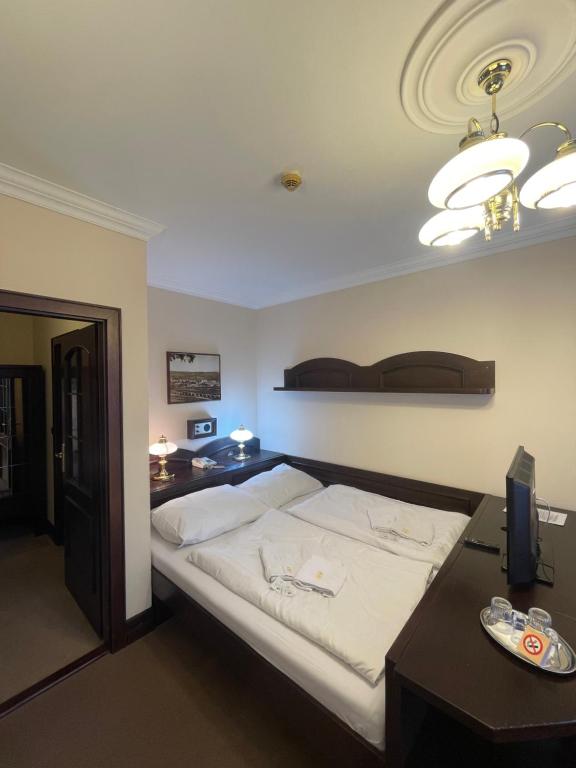 Postel nebo postele na pokoji v ubytování Hotel Bravo