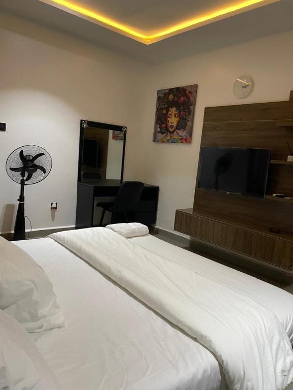 Postel nebo postele na pokoji v ubytování Accommodation Guru