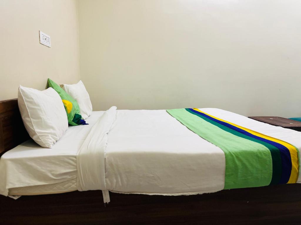 Postel nebo postele na pokoji v ubytování Fieasta Homestay