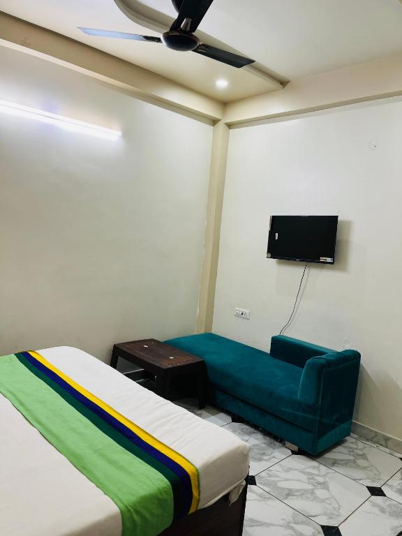 TV a/nebo společenská místnost v ubytování Fieasta Homestay