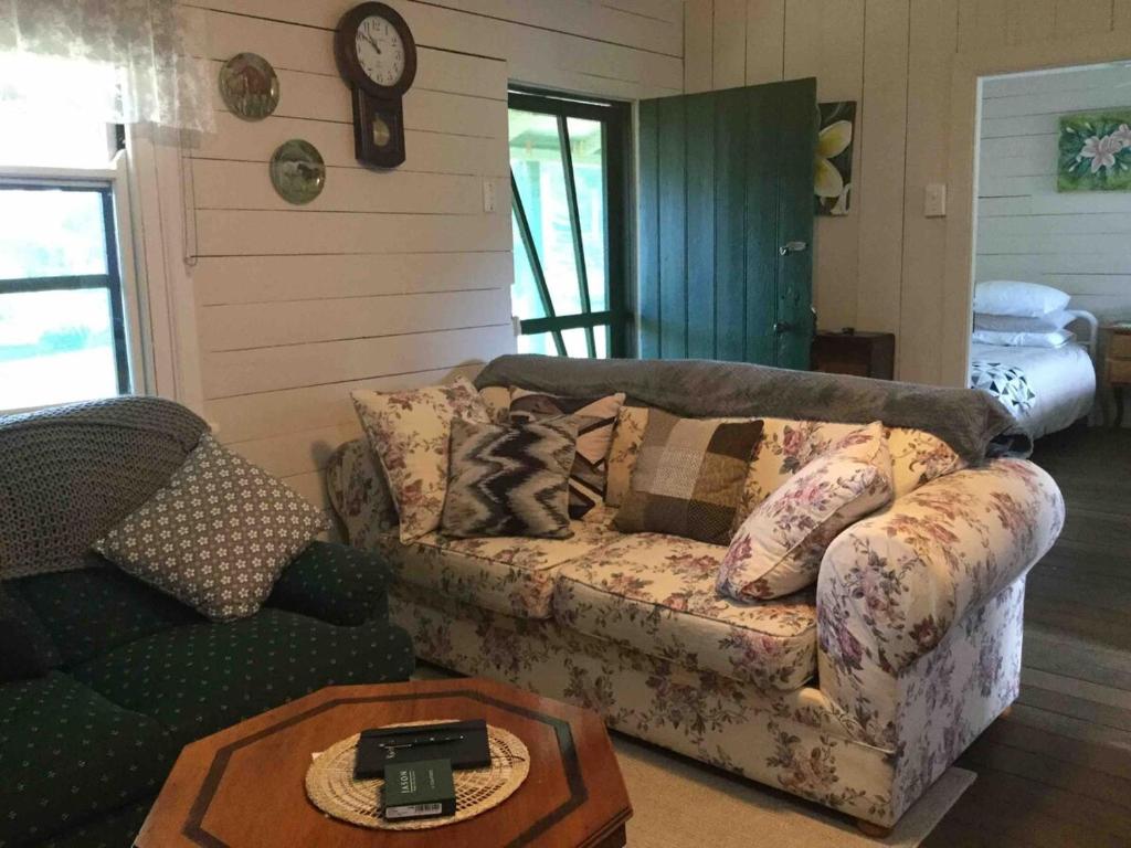 a living room with a couch and a table at The Cottage location is an ideal stay for Mountain Biking The Cottage location is an ideal stay for Mountain Biking in Paxton