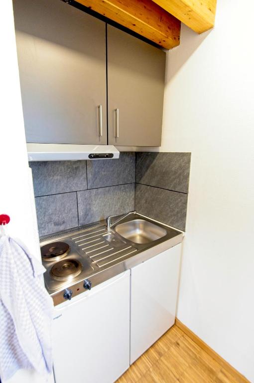 Kuchyň nebo kuchyňský kout v ubytování Boardinghouse Steinen