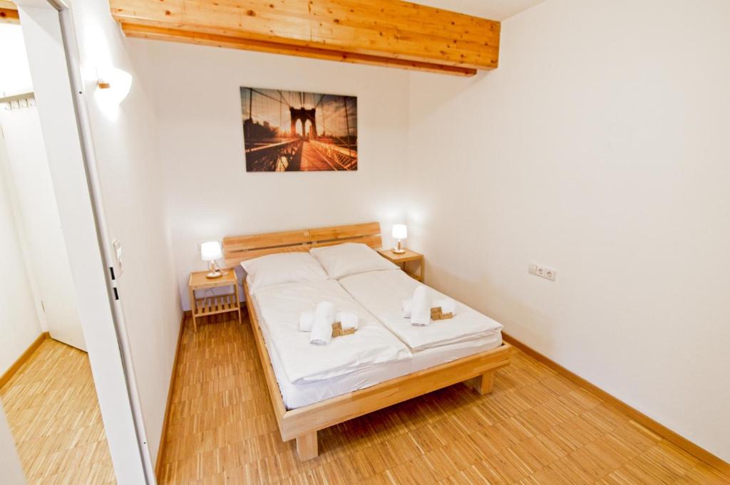 Postel nebo postele na pokoji v ubytování Boardinghouse Steinen