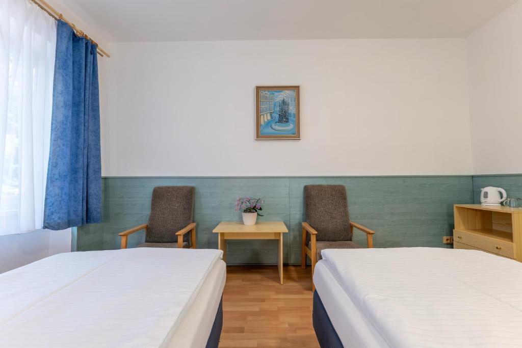 Voodi või voodid majutusasutuse Sport Hotel Gejzirpark toas