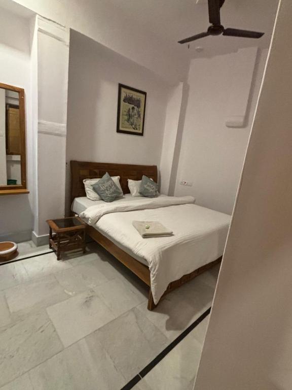 Postel nebo postele na pokoji v ubytování Ideal Guest House
