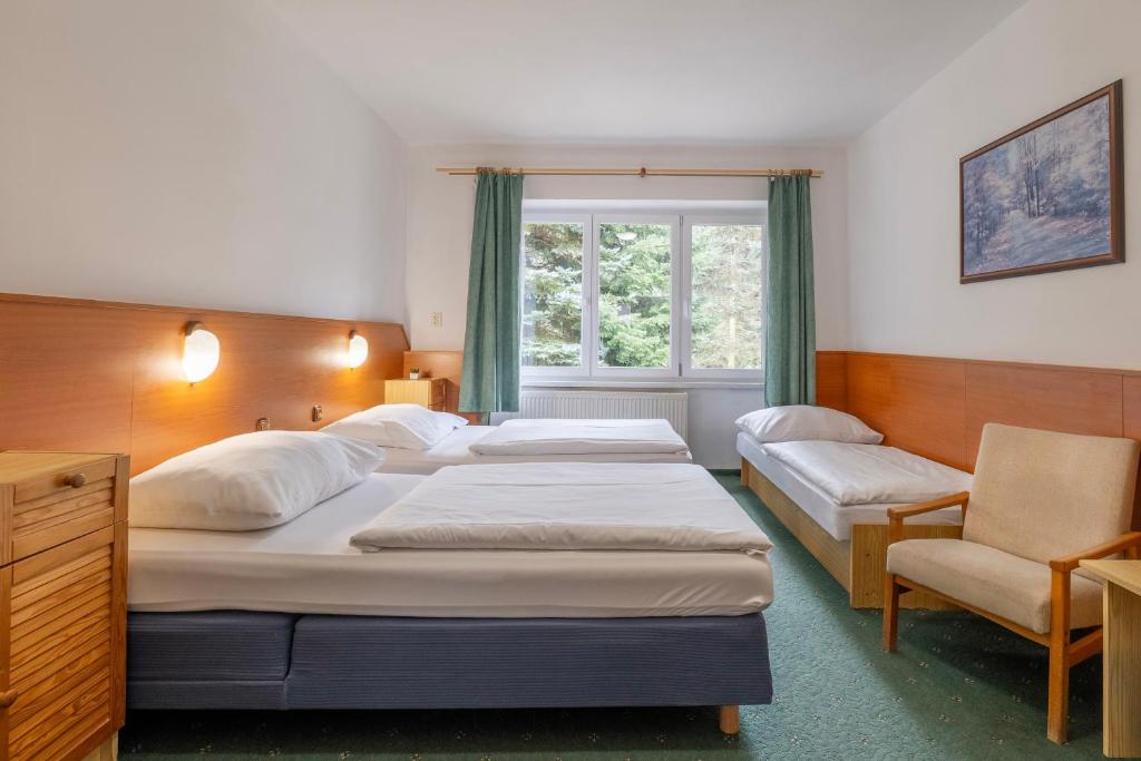 Voodi või voodid majutusasutuse Sport Hotel Gejzirpark toas