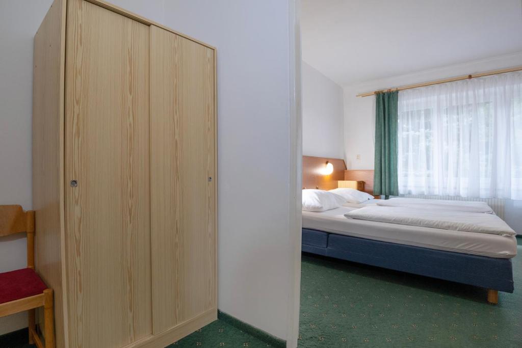 Voodi või voodid majutusasutuse Sport Hotel Gejzirpark toas