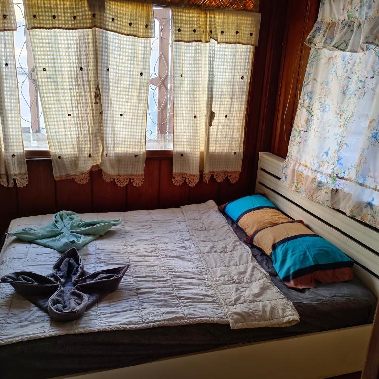 Postel nebo postele na pokoji v ubytování Sunny house hostel